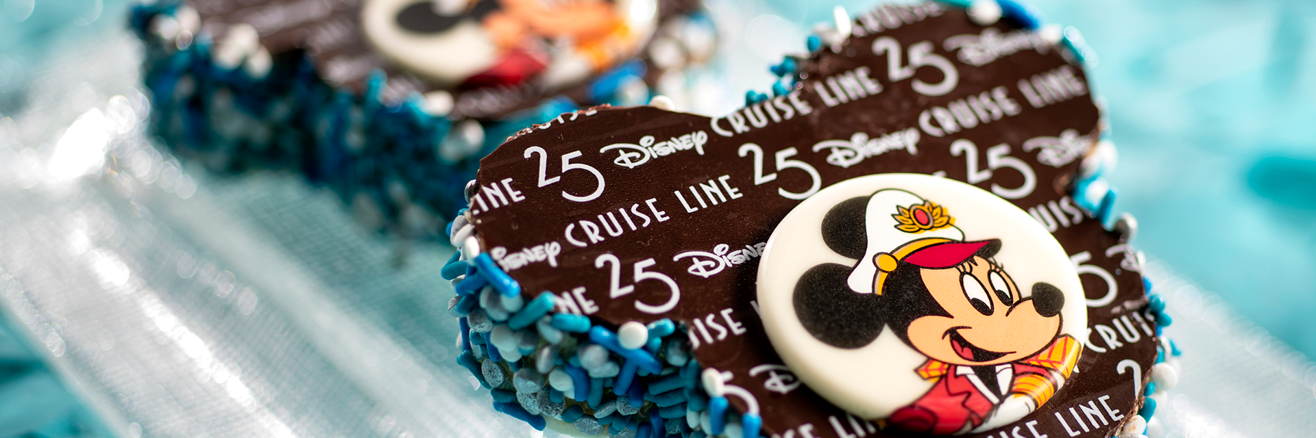25th Anniversary Minnie treat; chocolate; blue sprinkles