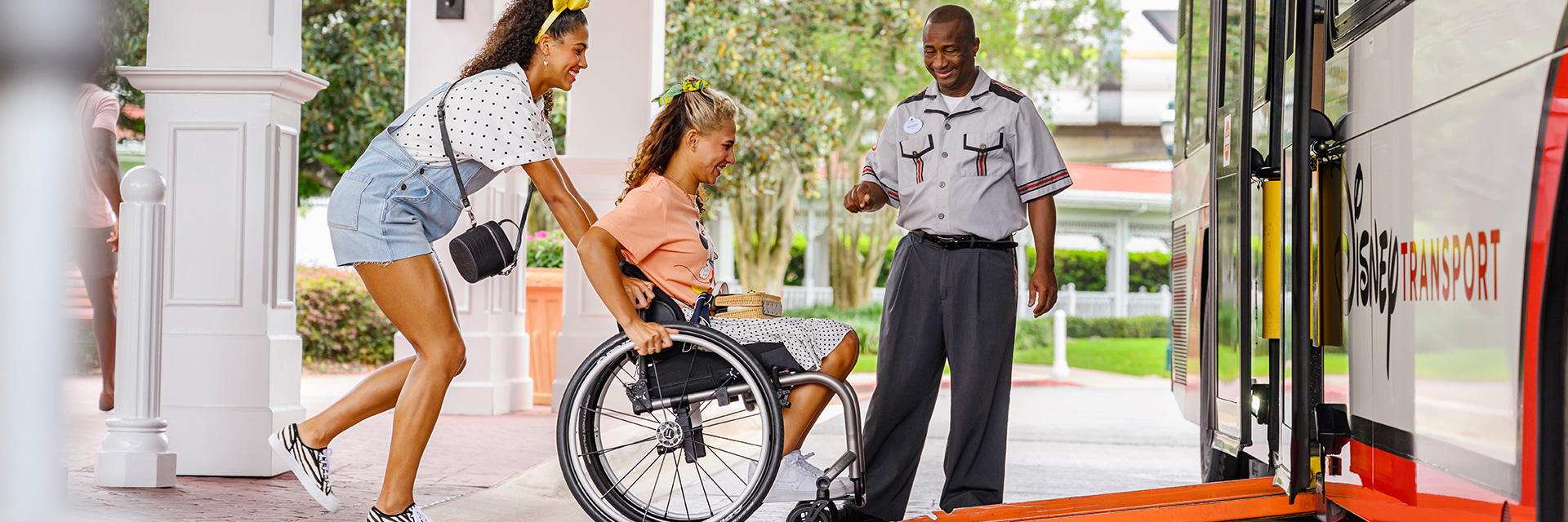 Woman in wheelchair boarding WDW bus