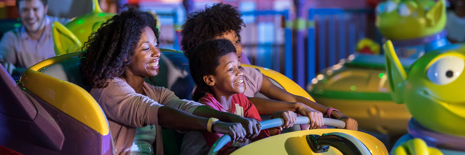 Toy Story Land; Alien Swirling Saucers; AA; Mom, daughter; son; Hollywood studios