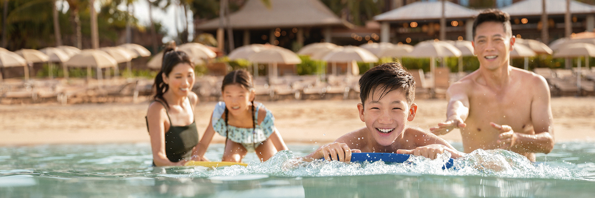 Kids in ocean at Aulani