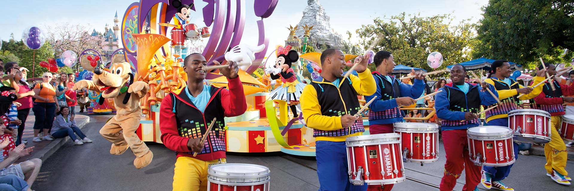 dlr activities 12; Drummers, Mickey, Minnie, and Pluto during daytime parade; Main Street; float
