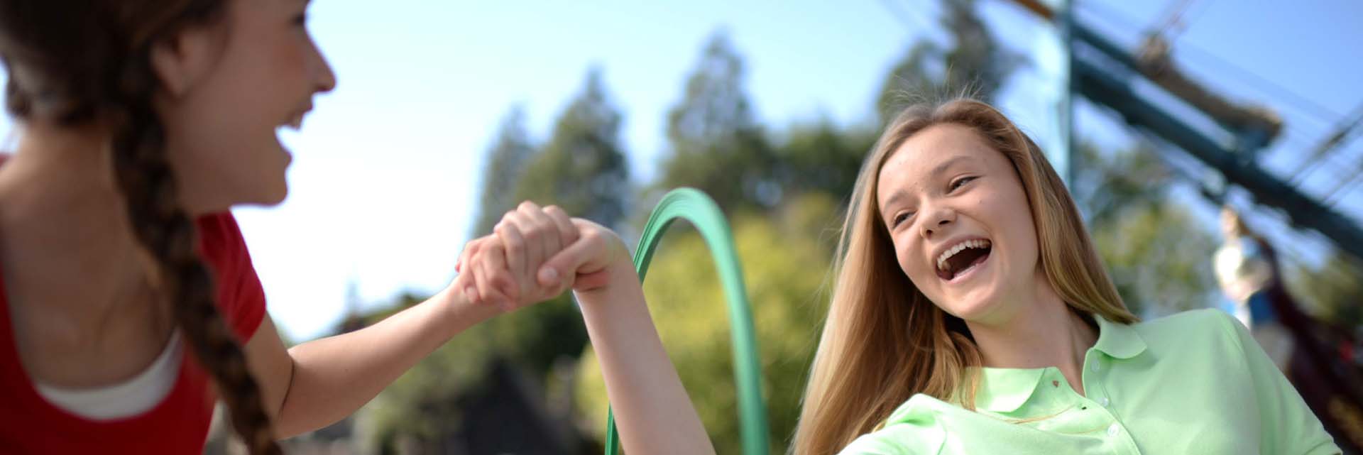 dlr planning 0; teenagers; girls holding hands; smiles; hula hoop; games