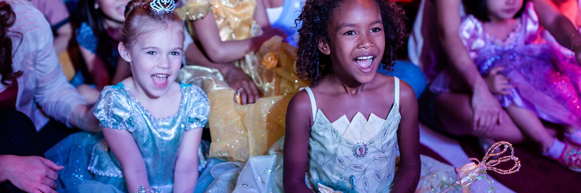 Two Little Girls at Live Show; AA; in costume; diverse and inclusion; Cinderella; Tiana