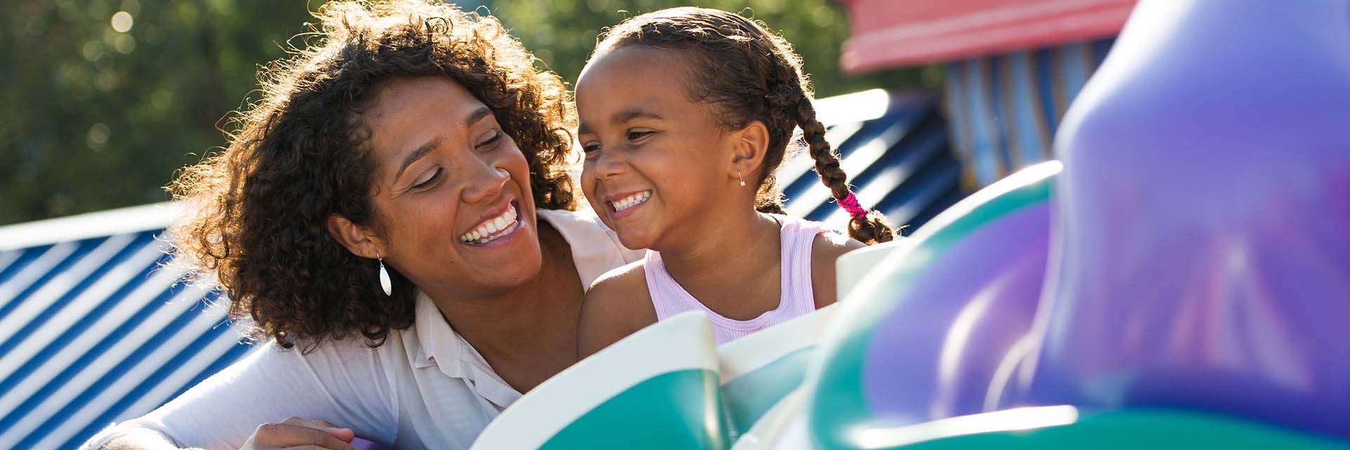 Mom and daughter on Dumbo