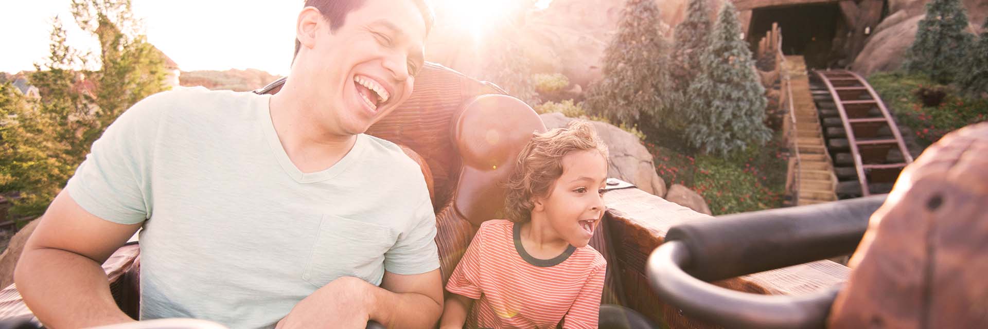 Father and Child on Seven Dwarfs Mine Train
