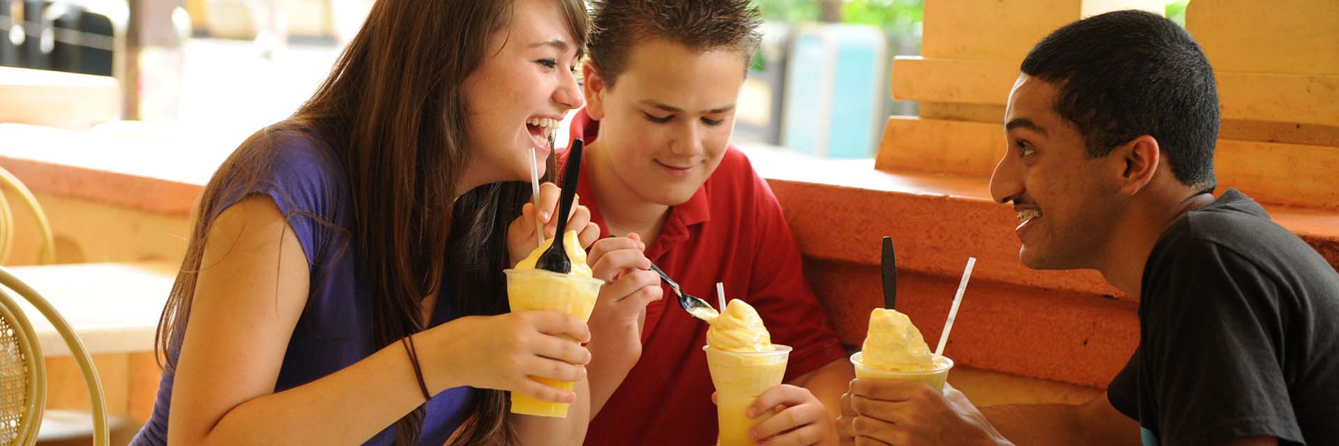 Friends Enjoying Dole Whip; boys, girl; diverse