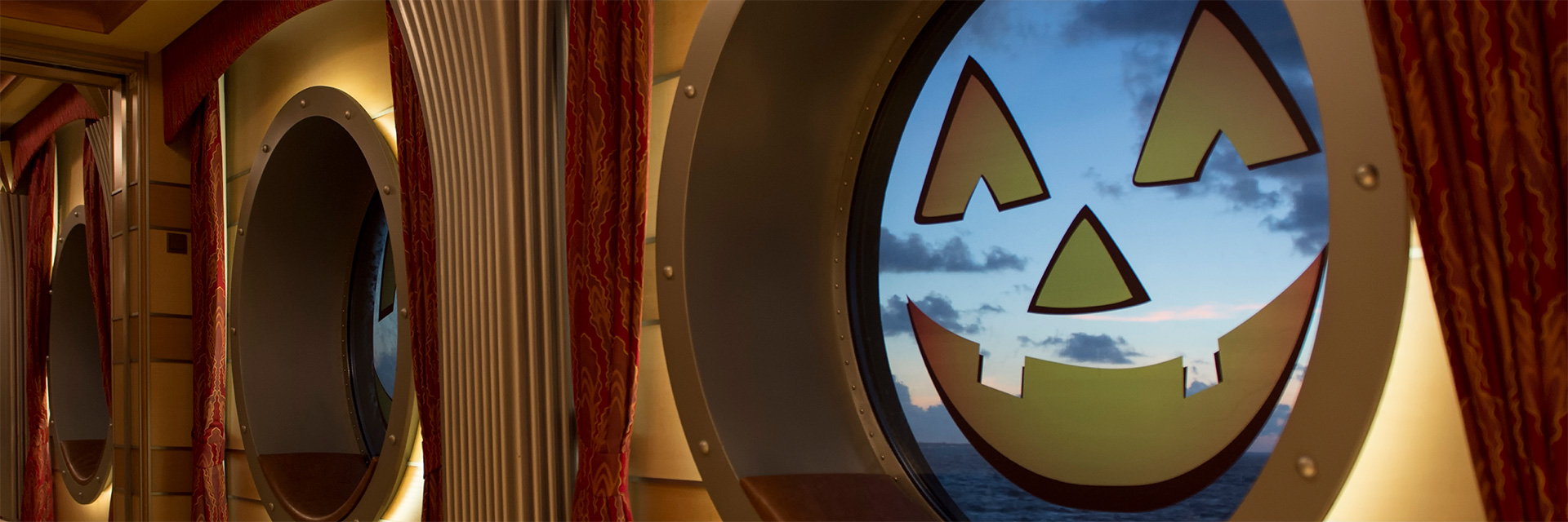 Photo of a Disney Cruise Line Porthole with jack'o'latern face